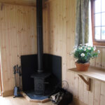 Fireplace inside Shepherd's Hut